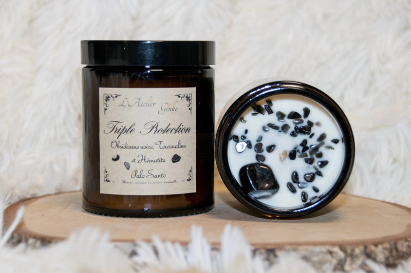 Bougie lithothérapie parfumée Triple protection avec pierre de tourmaline, hématite et obsidienne et parfum palo santo.
