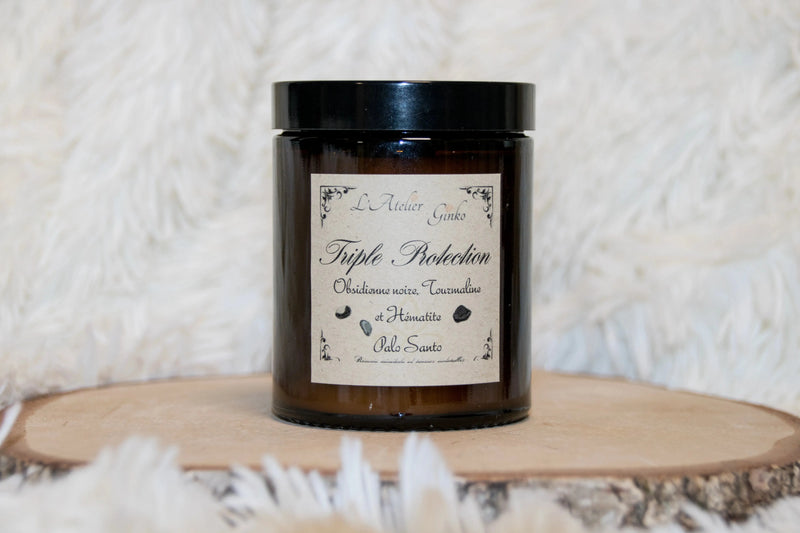 Bougie lithothérapie parfumée Triple protection avec pierre de tourmaline, hématite et obsidienne et parfum palo santo.