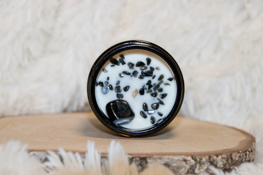 Bougie lithothérapie parfumée Triple protection avec pierre de tourmaline, hématite et obsidienne et parfum palo santo.